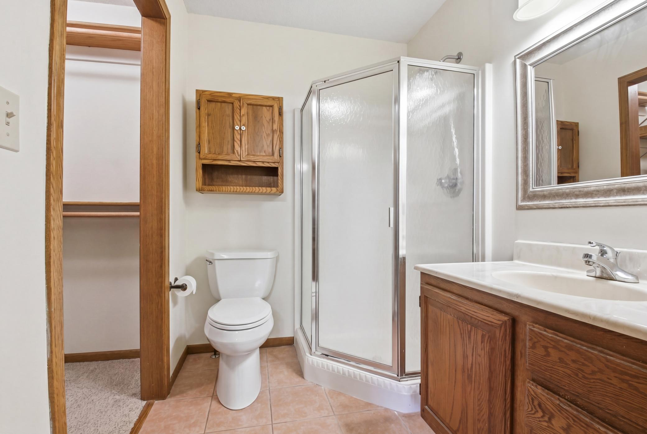Primary 3/4 bath with walk in closet