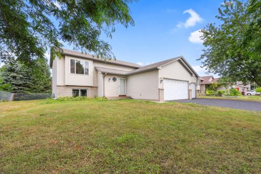 This feels like the kind of home you can settle into right awayâmature trees, a comfortable neighborhood setting, and a front door that starts to feel familiar pretty quickly