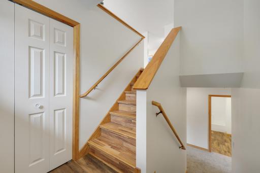 The entry offers plenty of closet space and direct access to the garage