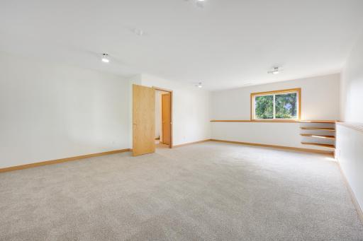 Another look at the lower-level family room and its generous size