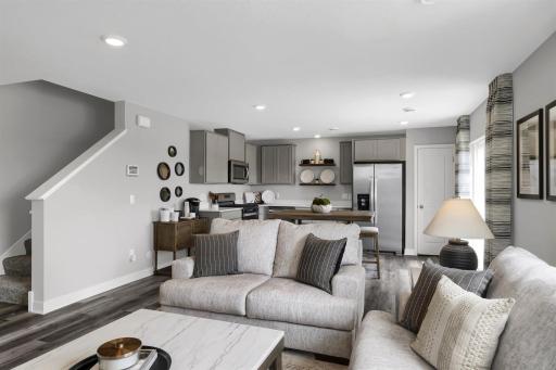 Welcome home to the Duet by D.R. Horton! Complete open concept main floor for all your entertaining needs! (Model photo, colors may vary)