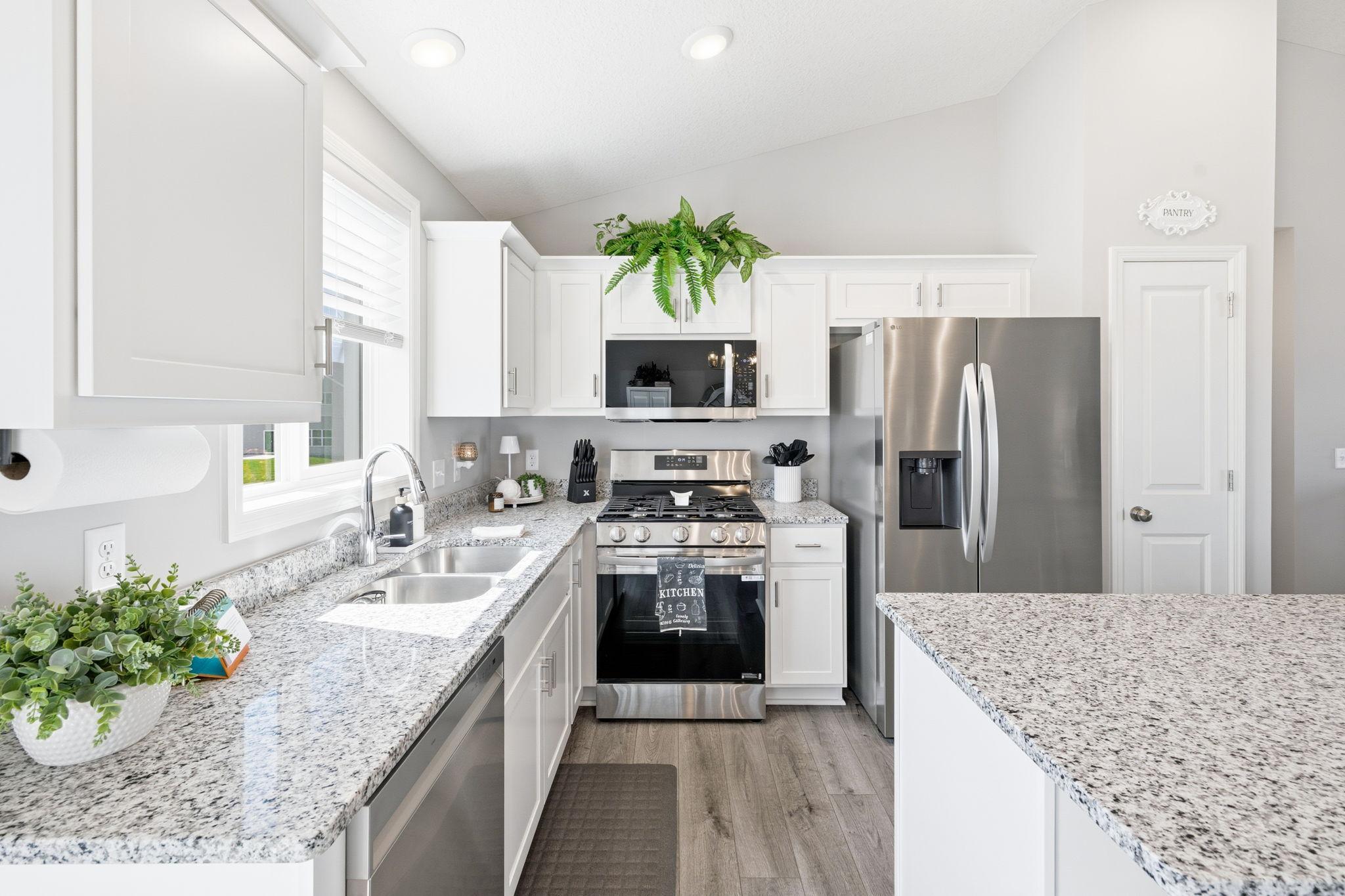 Solid surface counters highlight the beautiful kitchen!