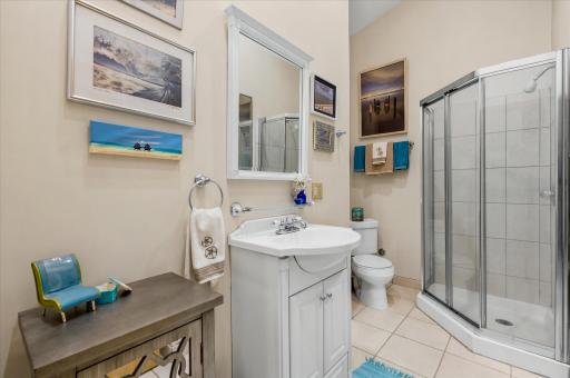 Second bathroom on upper level with walk-in shower