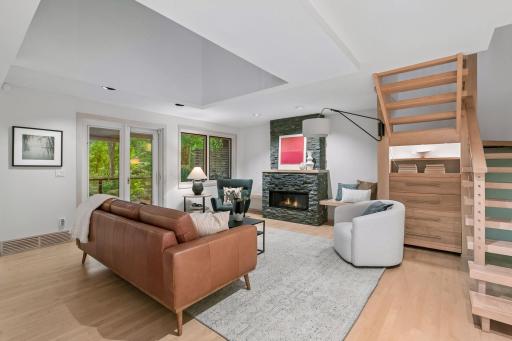 Warm, welcoming interior with extensive windows and natural light.
