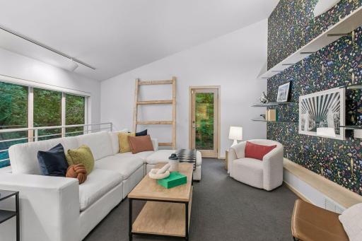 Cozy & versatile 3rd-floor family room. Easy access to the backyard.