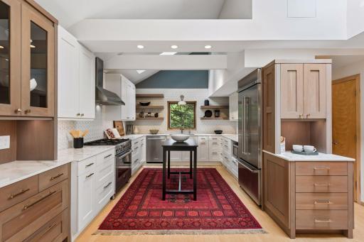 A well-designed kitchen offers abundant cabinetry, open shelving, and generous workspace.