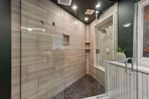 Large walk-in shower with contemporary tile.