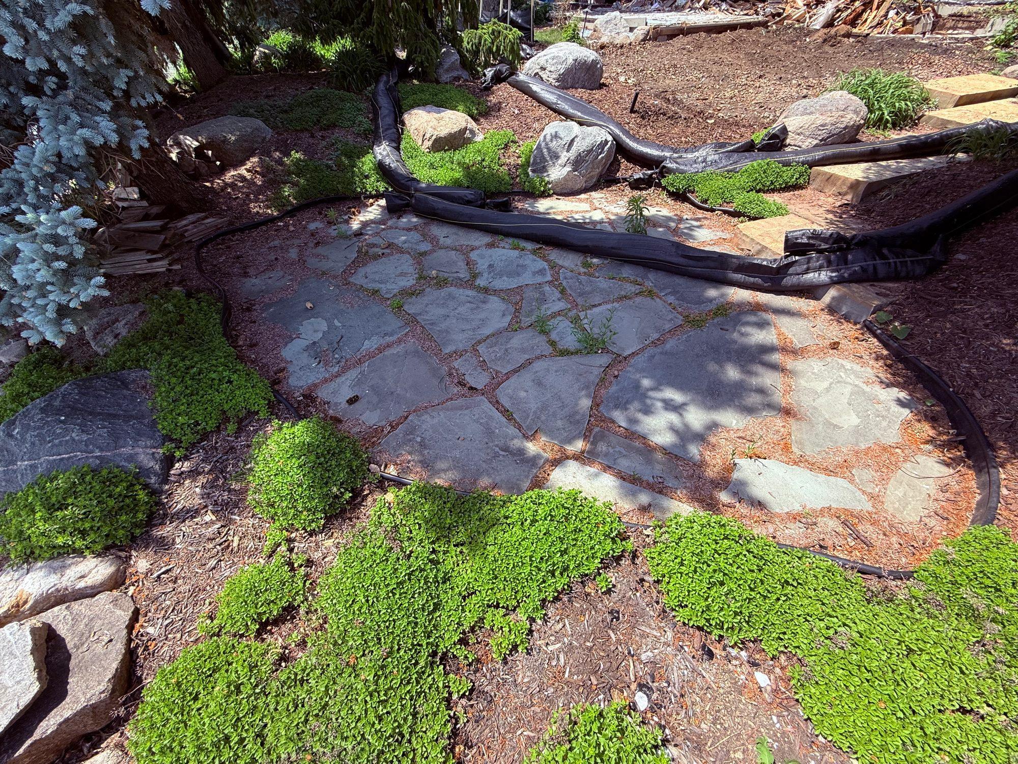 One of several patio or firepit areas
