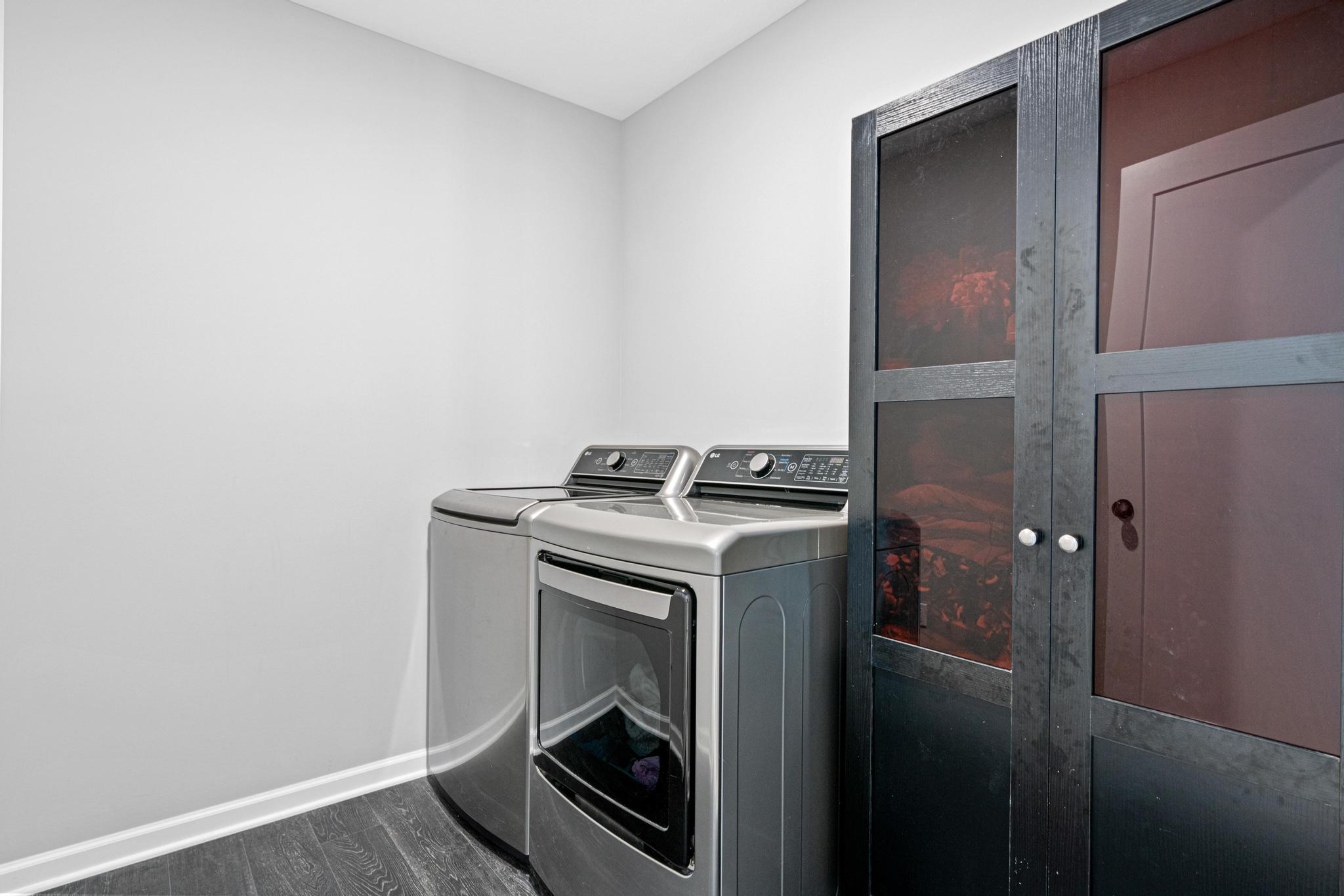 Upper level laundry, conveniently located between all 4 bedrooms