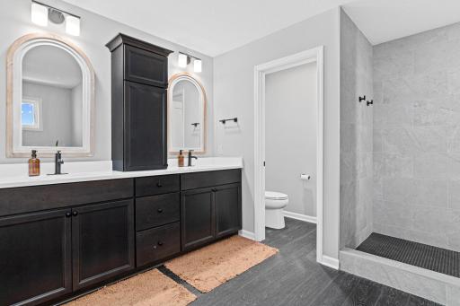 Primary bath. Double sinks, walk-in shower, separate soaking tub & private stall