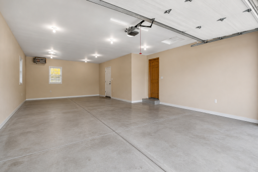 Oversized 3 car garage with extra height garage door
