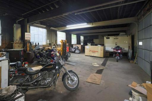 4215 E Lake St Garage Interior DriveIn door to outside.jpg