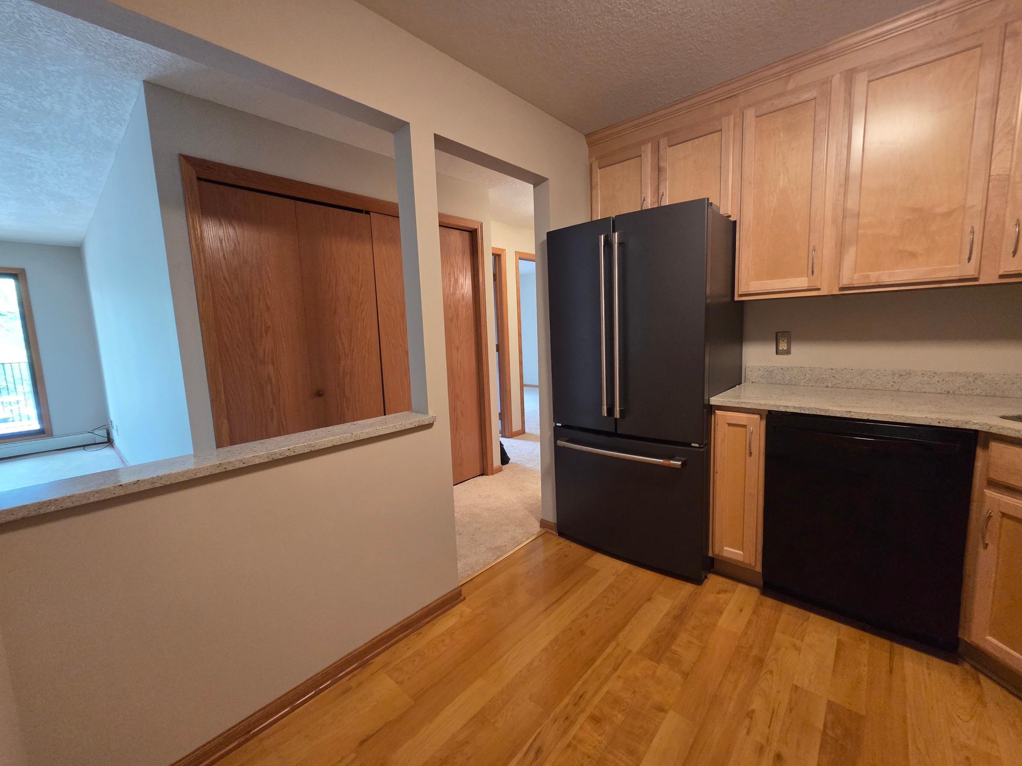The closet across the hall from the kitchen has the washer & dryer.