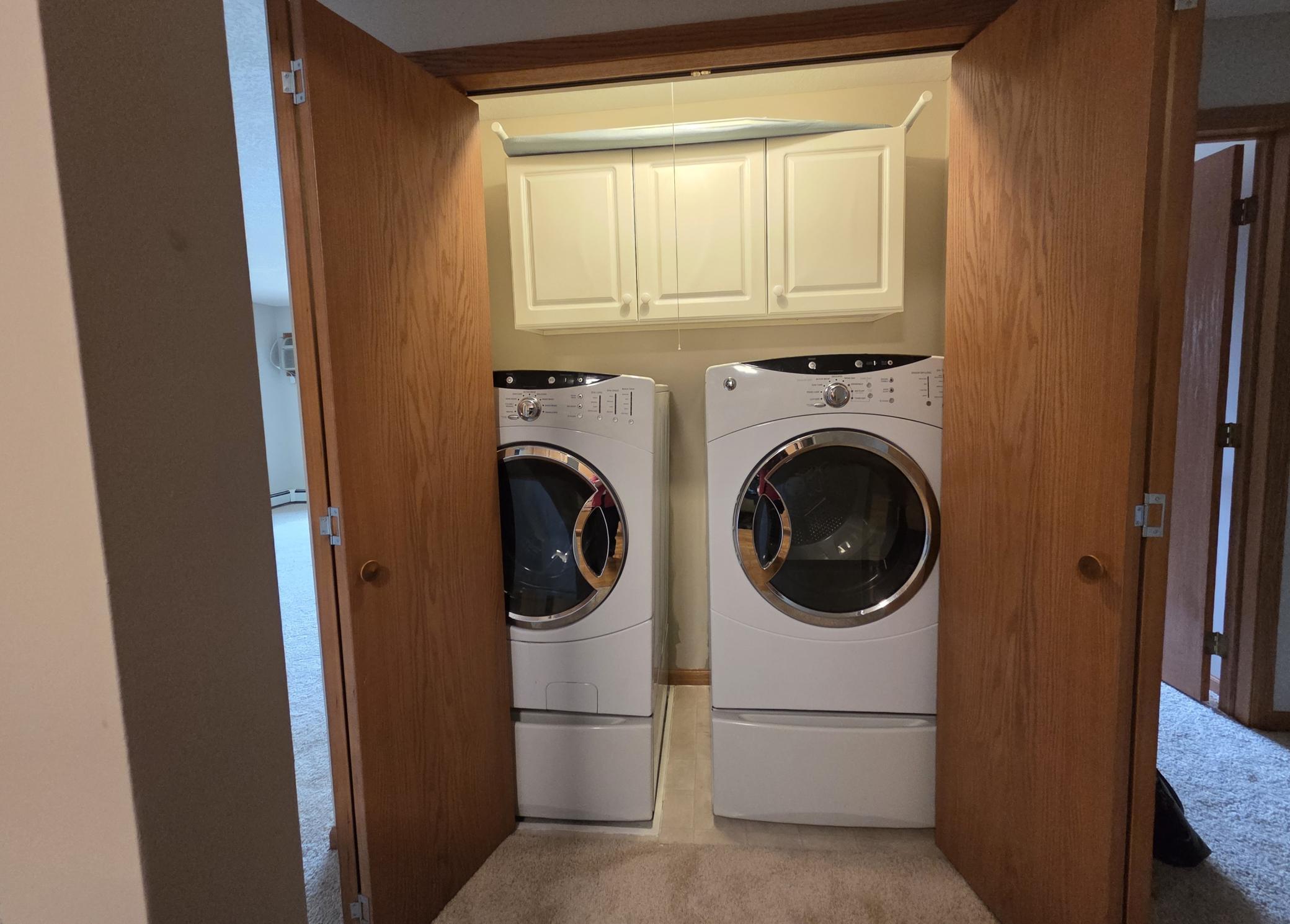 Here is the GE front-loading washer & dryer, as well as the newer cabinets above.