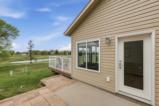 Patio to deck on 18th fairway of Village Green Golf Course