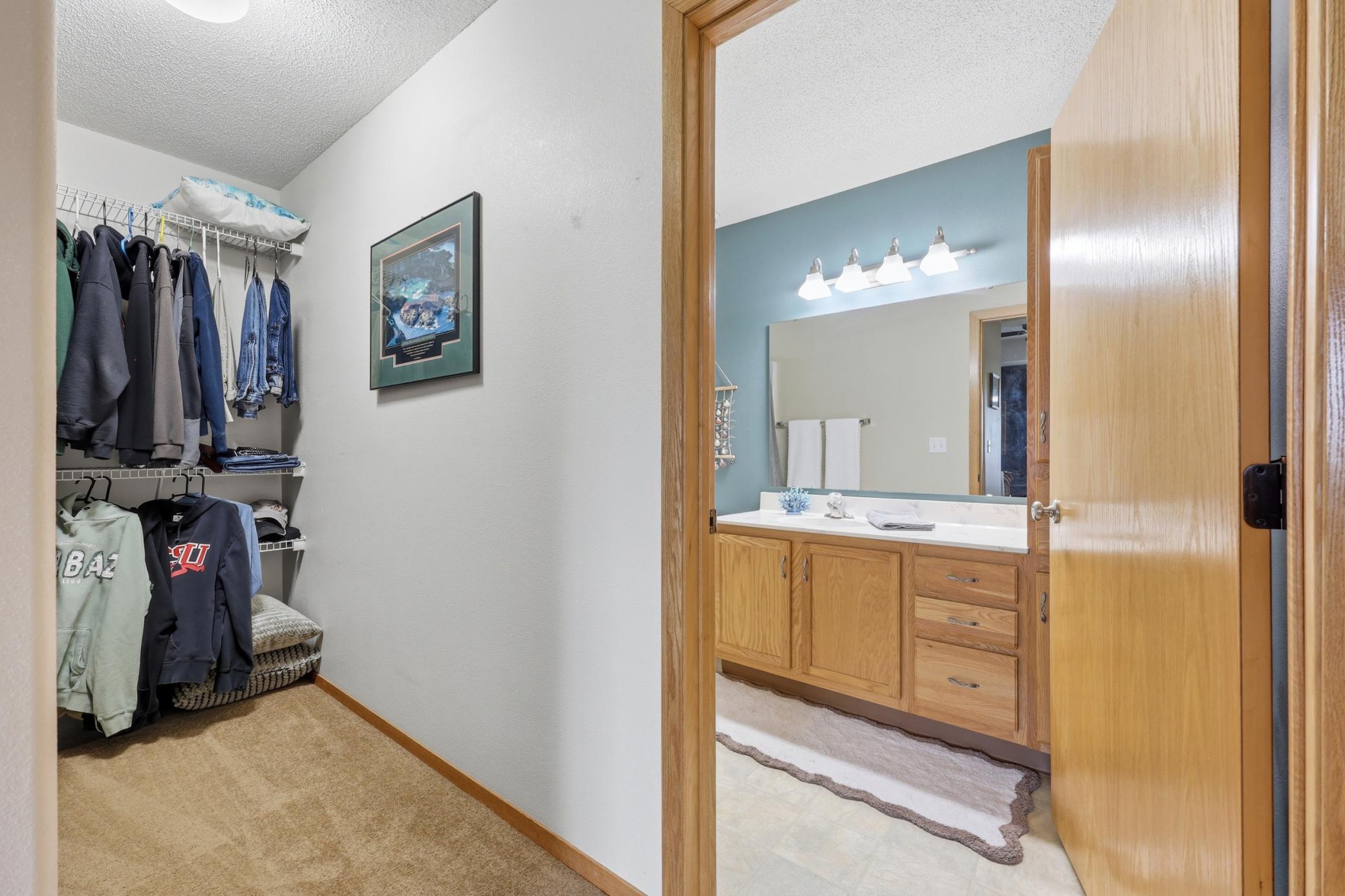 Walk in closet to full bathroom