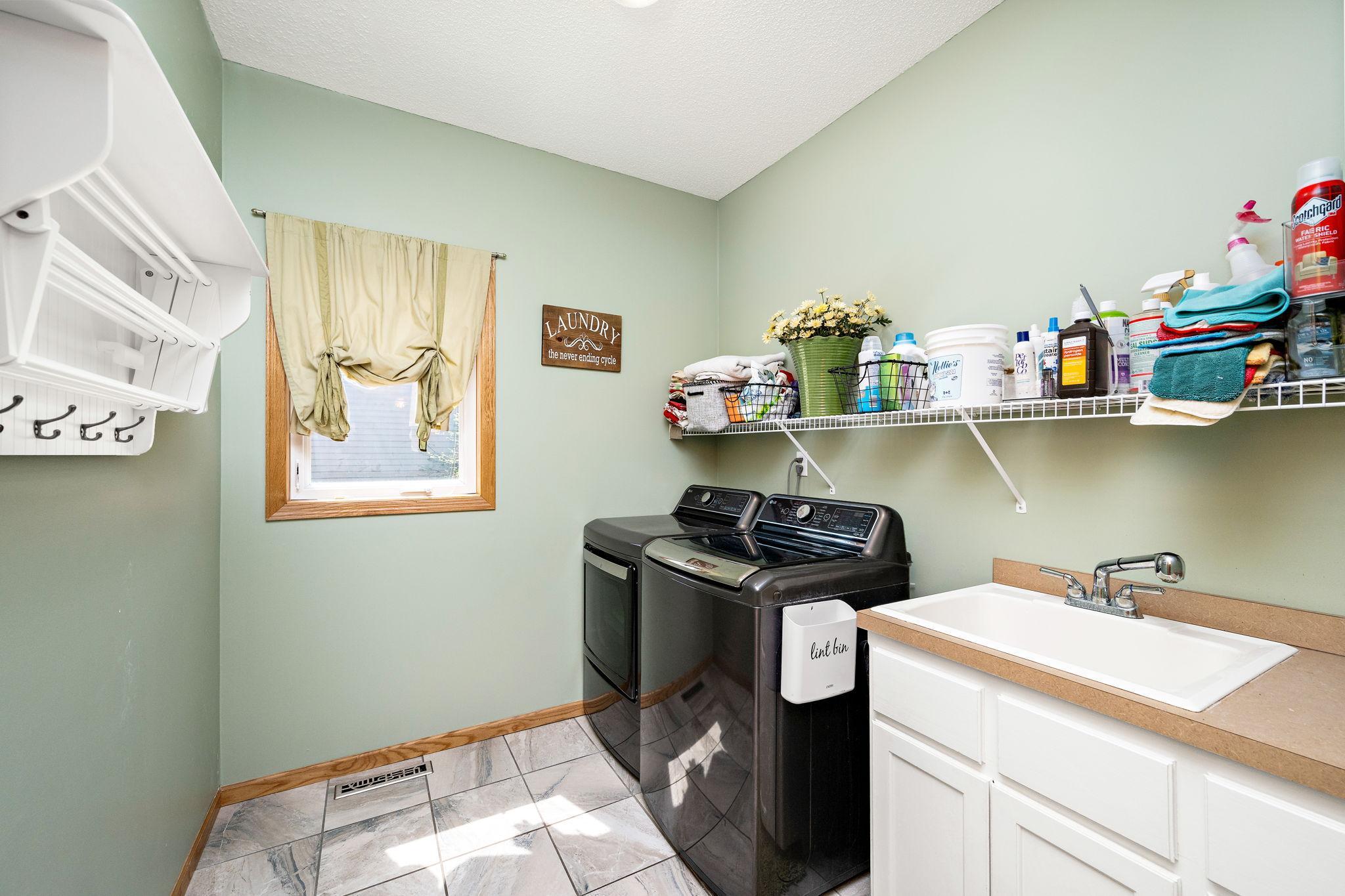 Laundry room has sink
