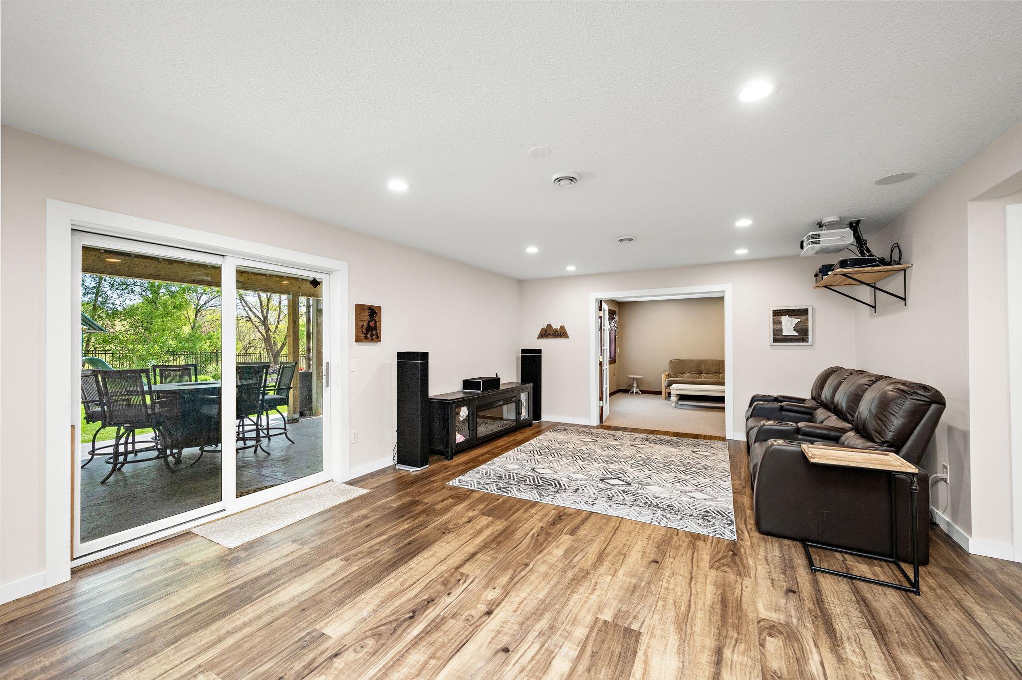 Lower level family room walks out to beautiful stamped concrete patio