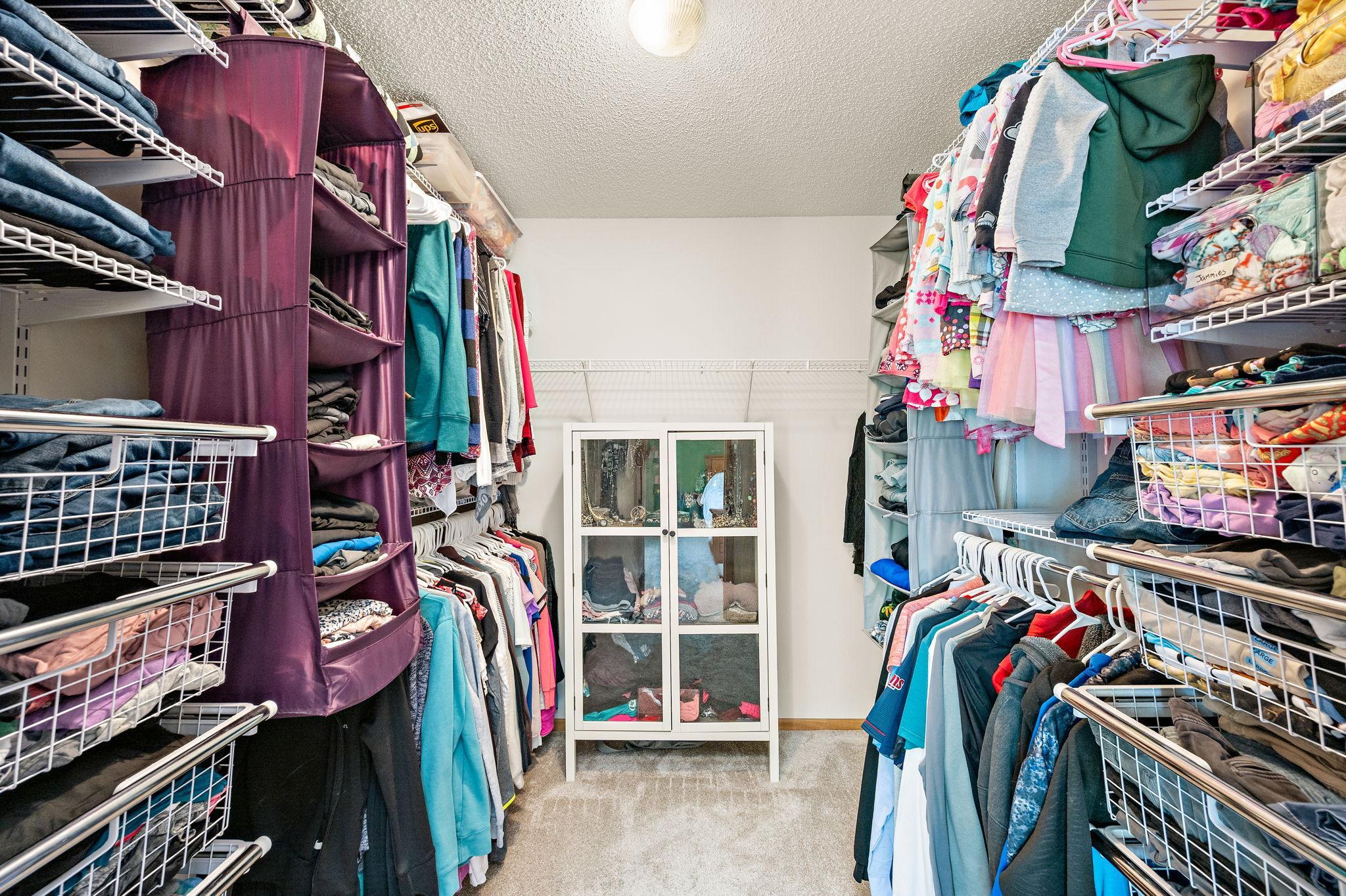 Primary bedroom suite walk-in closet