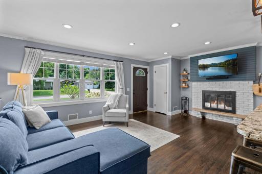 An abundance of windows fills the home with natural light, creating a bright and welcoming environment.