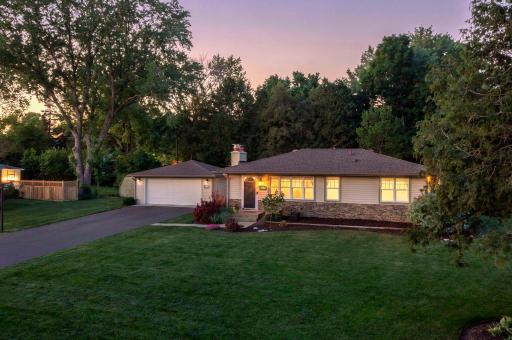 Nestled on an incredible .40 acre lot with tree lined backyard, meticulous landscaping, and outstanding outdoor spaces.