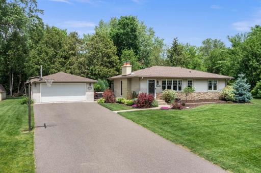 Fantastic lot offers long drive with extra parking if needed for guests and entertaining.