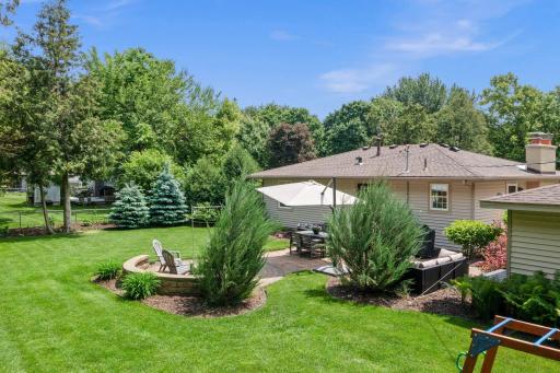 Fabulous backyard retreate highlighted by meticulous landscaping and design.
