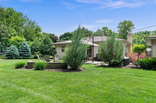 Fabulous backyard retreate highlighted by meticulous landscaping and design.