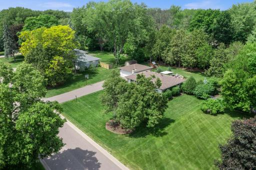 Gorgeous .40 acre lot is a standout with beautiful mature trees.