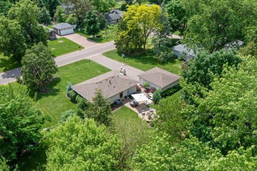 Situated on a gorgeous .40-acre flat lot with mature trees, meticulous landscaping, and outstanding outdoor living spaces. Just one block from both Birchview Elementary and Central Middle School, with a short drive to downtown Wayzata, Lake Minnetonk