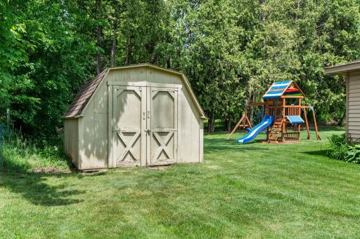 Storage shed offers extra space for outdoor equipment, extra toys and many things.