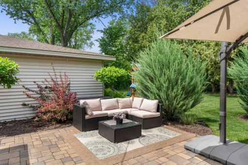 Enjoy easy indoor-outdoor living with two main-level walkouts leading to inviting backyard patios.