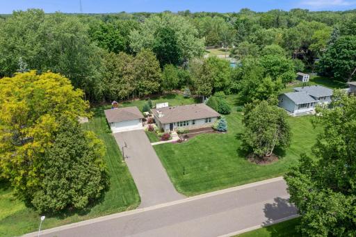 Gorgeous .40 acre lot is a standout with beautiful mature trees.