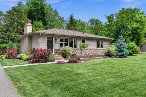 Standout curb appeal with meticulous landscaping, mature trees, updated room in 2024, and beautiful mix of stone and vinyl siding exterior. Impeccably 4-bedroom, 3-bath is move in ready offering gorgeous updates and design.