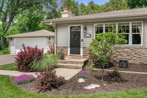 Welcome home to 15620 2nd Ave No, Plymouth. Meticulous maintained landscaping and exterior spaces.