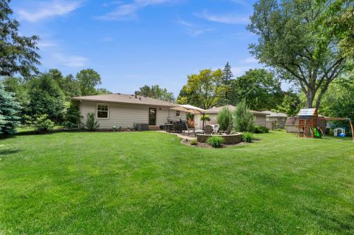 Enjoy easy indoor-outdoor living with two main-level walkouts leading to inviting backyard patios.