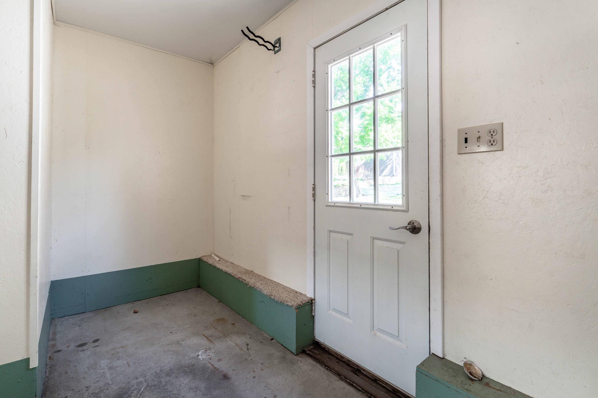 F03-Garage Storage & Back Door.jpg