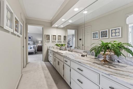Huge Vanity in dressing area with custom stone tops