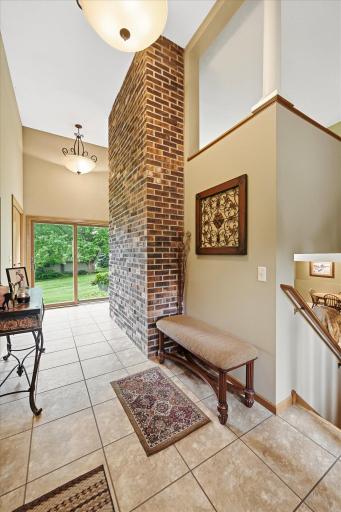 Ceramic tiled entry with patio door access to the backyard.
