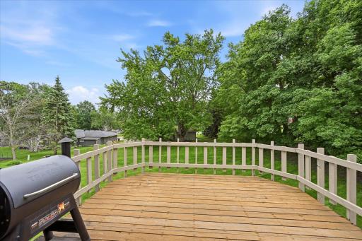 Southern facing deck overlooks the spacios backyard.