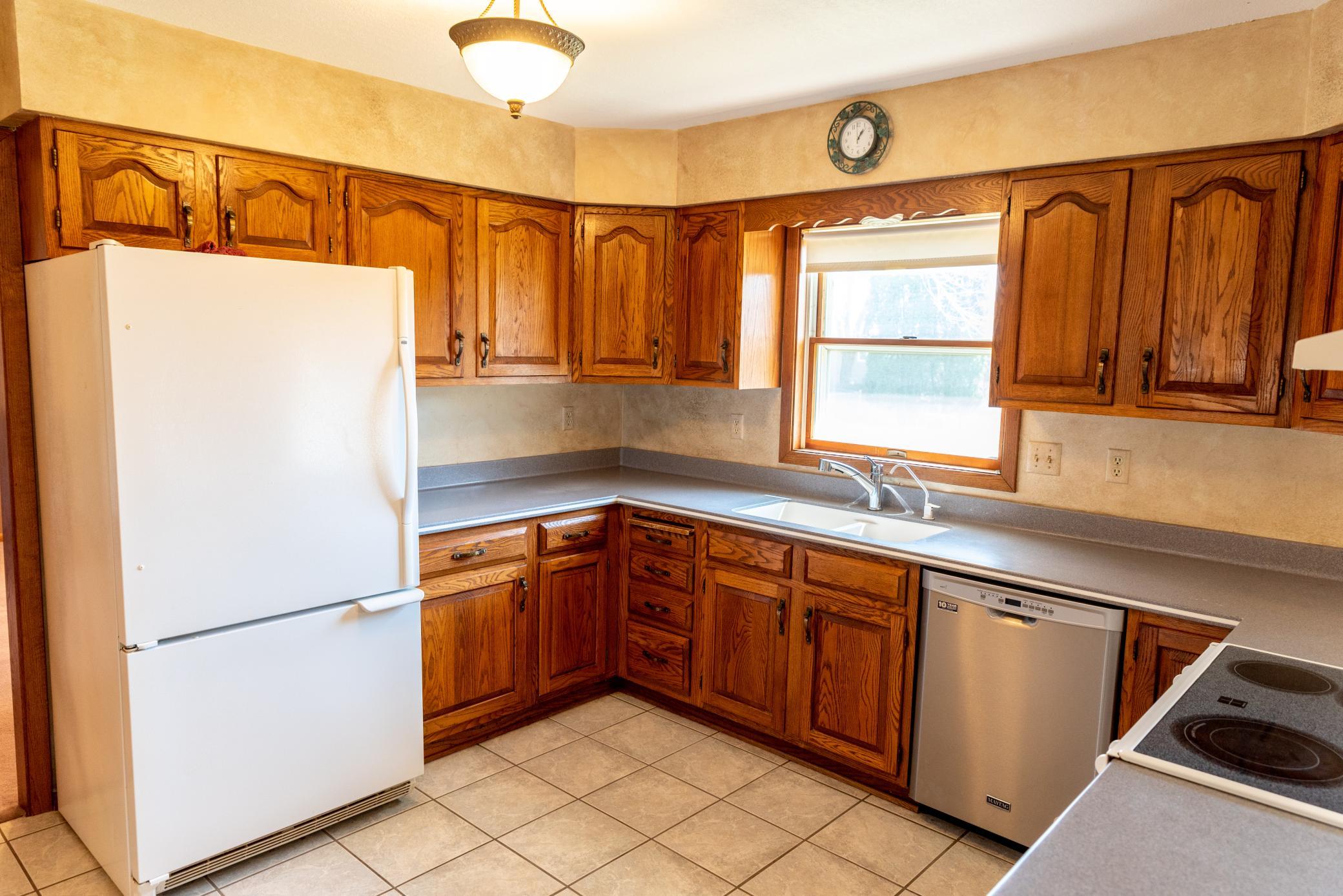 Solid oak cabinets & Duraceramic flooring.