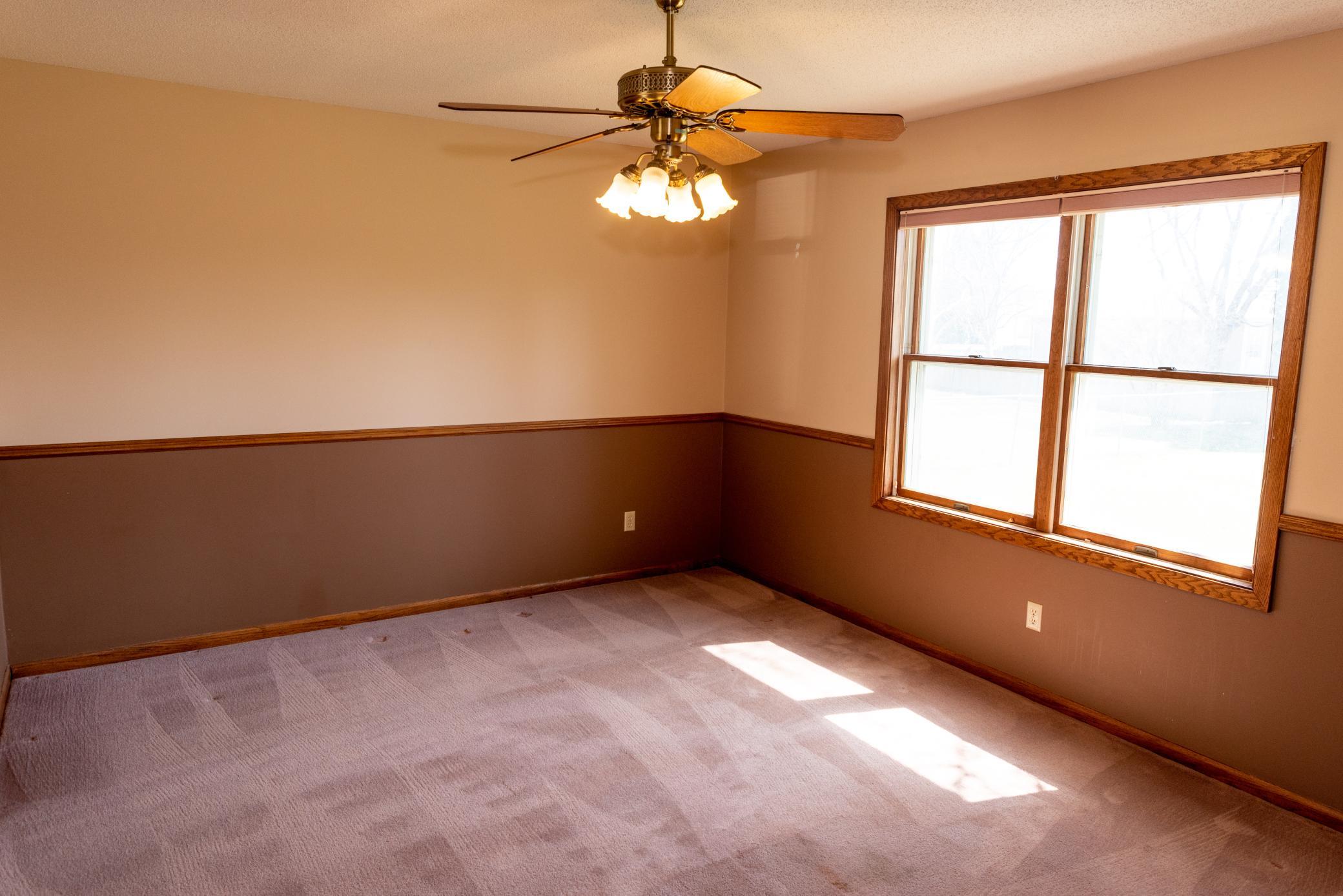 Large dining room also looks out over spacious back yard.