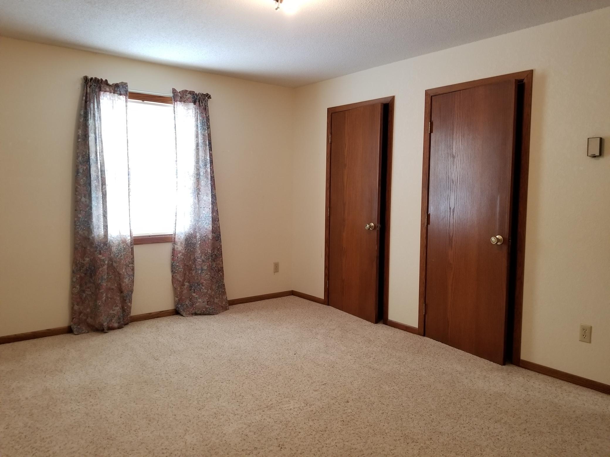 In addition to very spacious room, this upper level bedroom includes TWO walk-in closets!!!