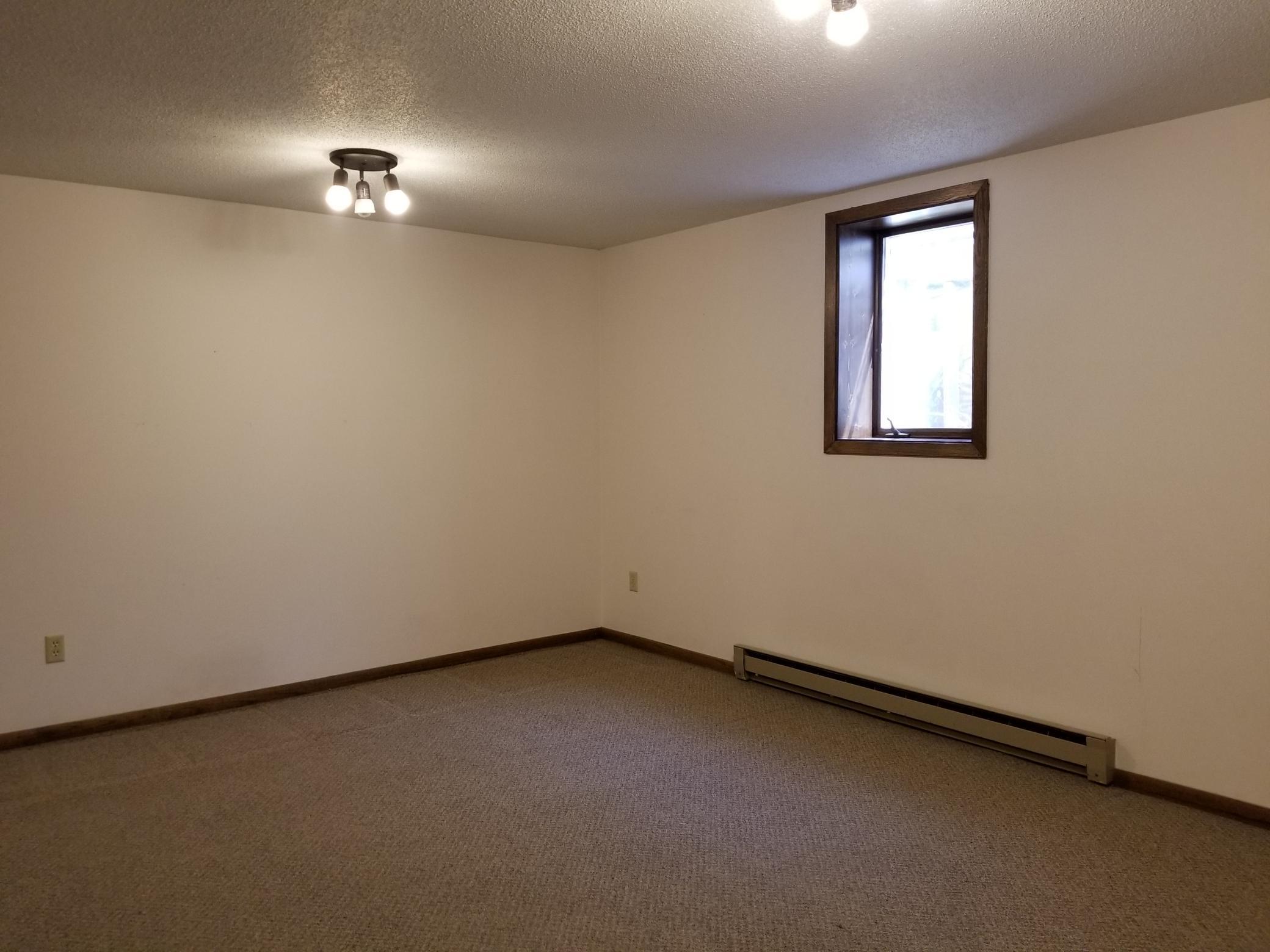 The 2nd large living space boasts egress window plus access to large office or workout room next door.