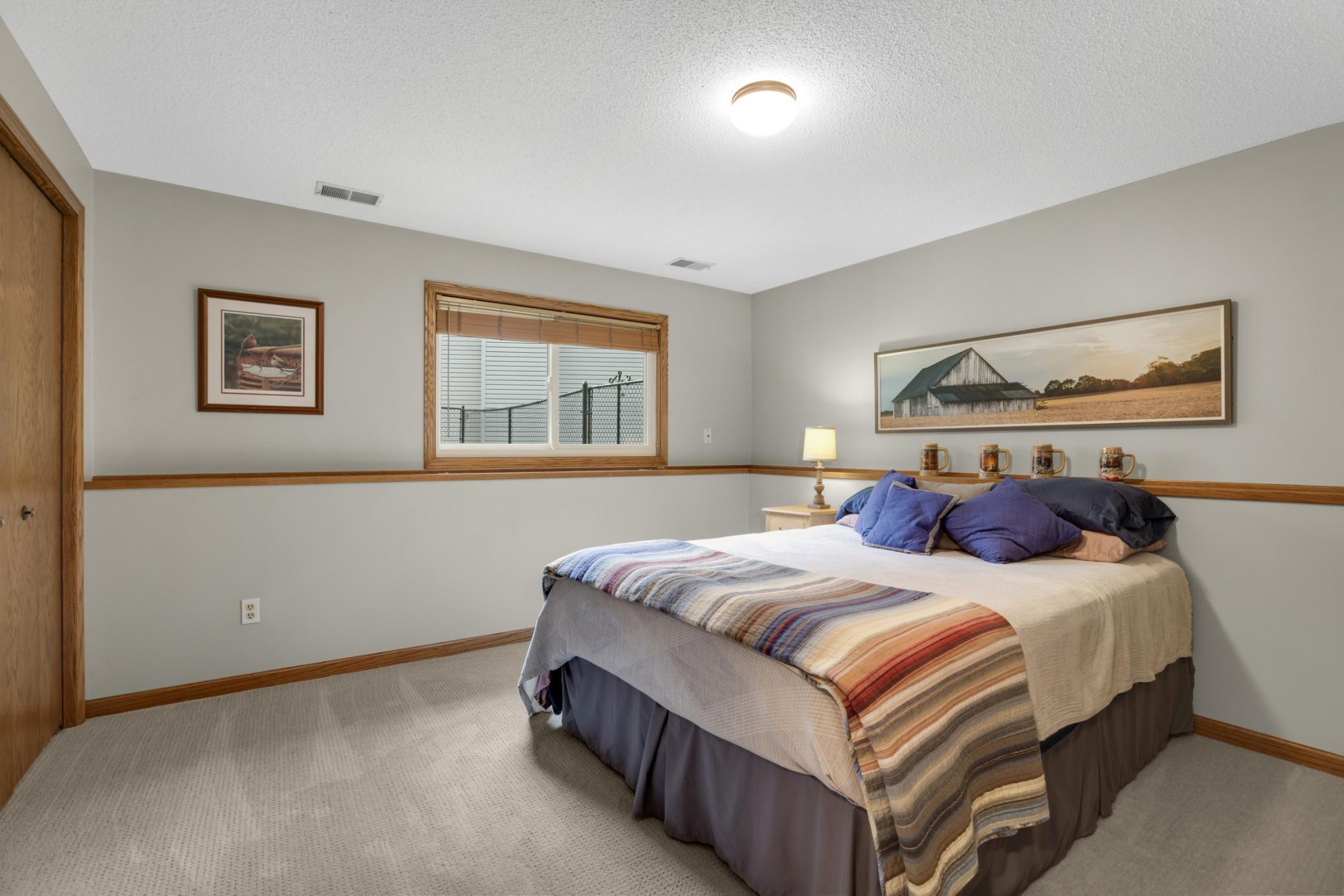 With ample space for larger furniture, this 4th BR room is ideal as a guest suite, teen bedroom, or additional flex space. Comfortable, functional, and versatile, this bedroom is ready to fit a variety of needs.