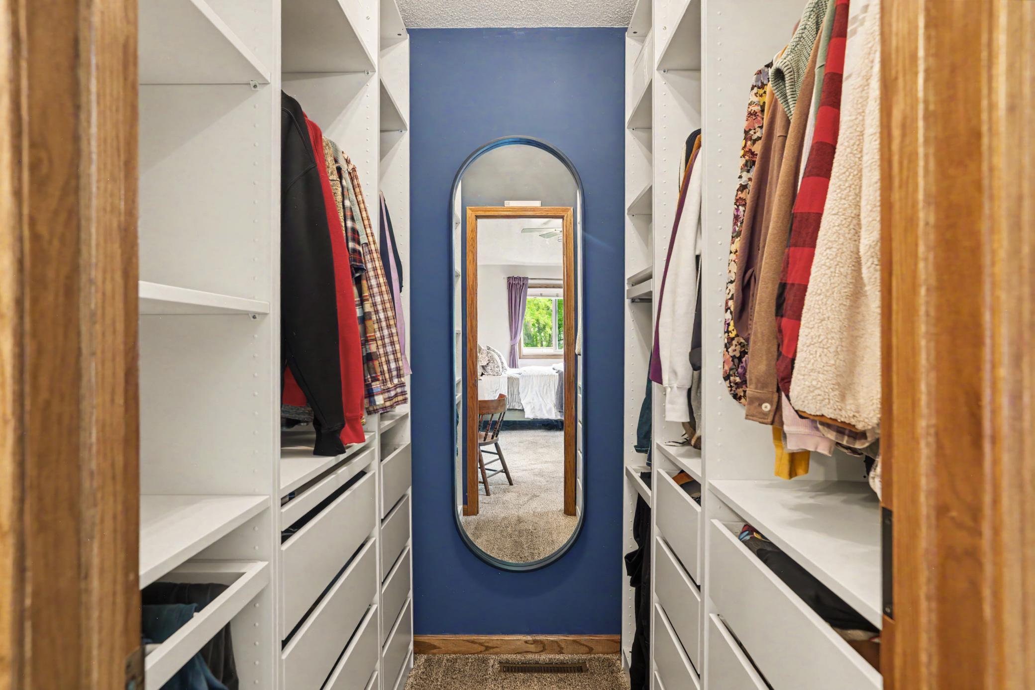 Not only does the primary bedroom have a walk in closet, but the closet has all of these fantastic built in's! This house has everything!