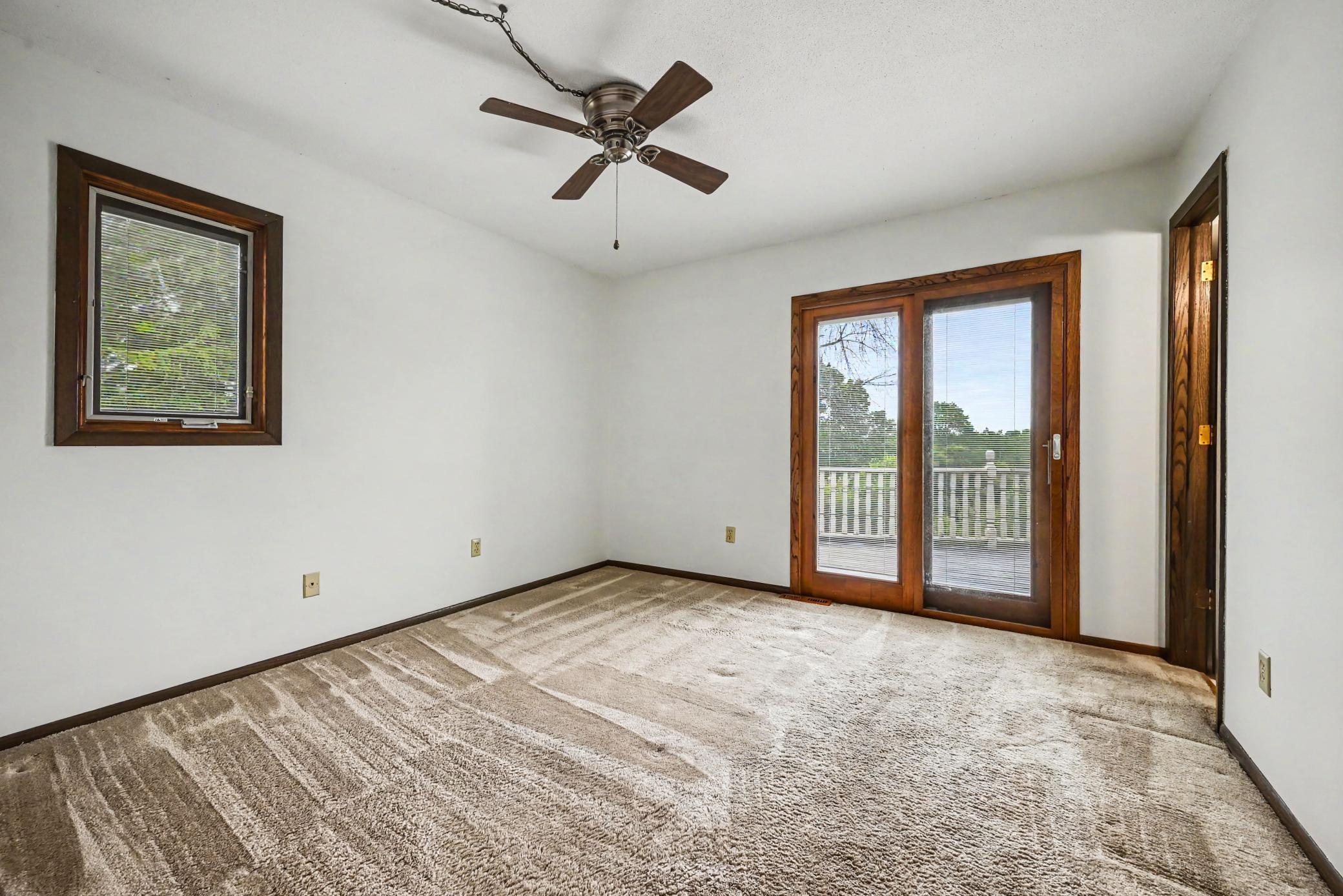 Primary Suite with door leading to deck