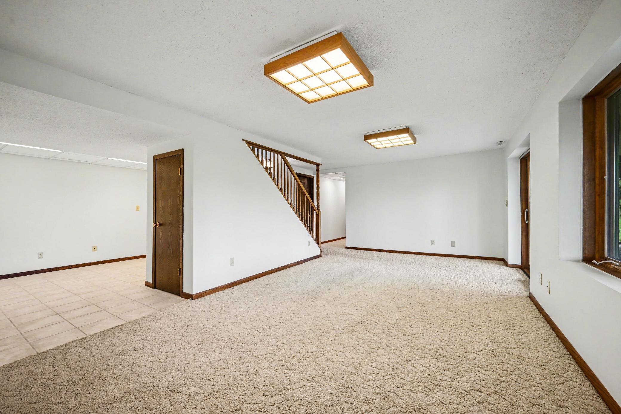 Family Room looking into Game Room with closet
