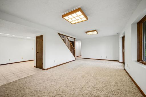 Family Room looking into Game Room with closet