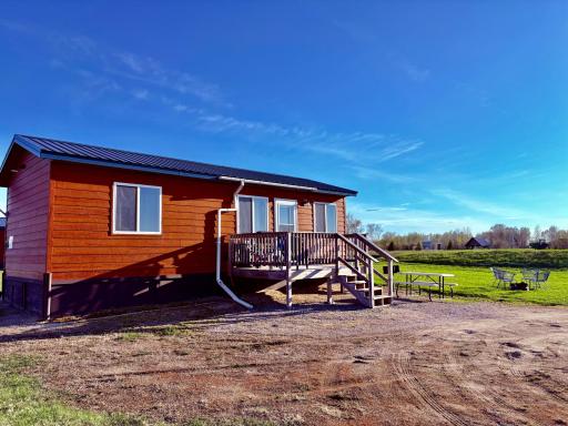 Front of cabin with deck